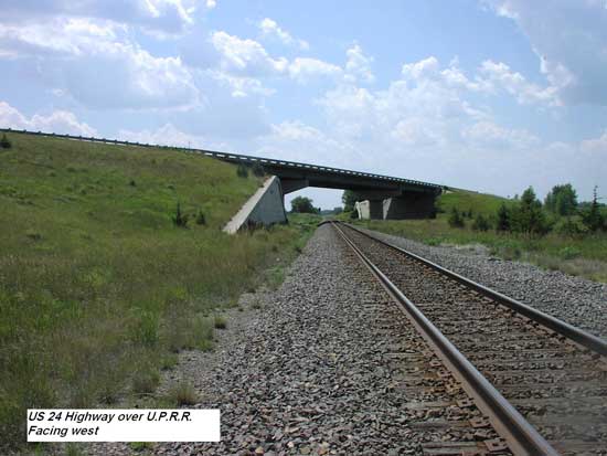 Photo from rail line up toward bridge