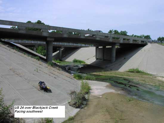 Two highway bridges over cement-lined creek