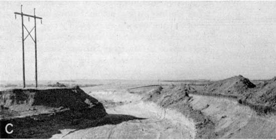 Black and white photo of shallow quarry.