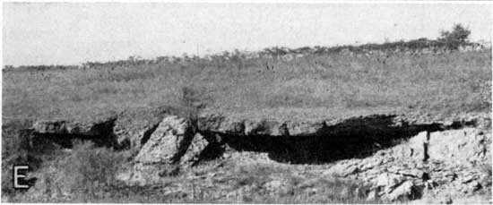 Black and white photo, outcrop shows resistant bed with eroded part below.