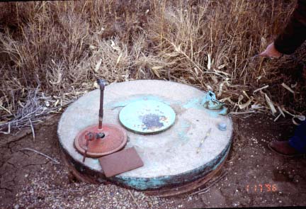 Plate on top of well is 3-3.5 feet across.