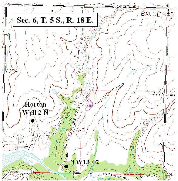 Scanned part of topo map, test hole in far south-central part of section; city well is near center of southwest corner of the section.