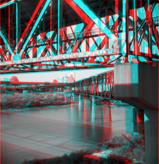 Photo across Kansas River; railroad and auto bridges