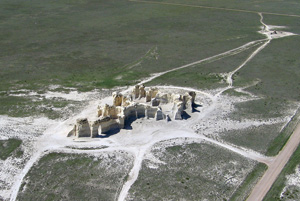 Photo from kite; view of chalk cliffs of Monument Rocks from an angle.