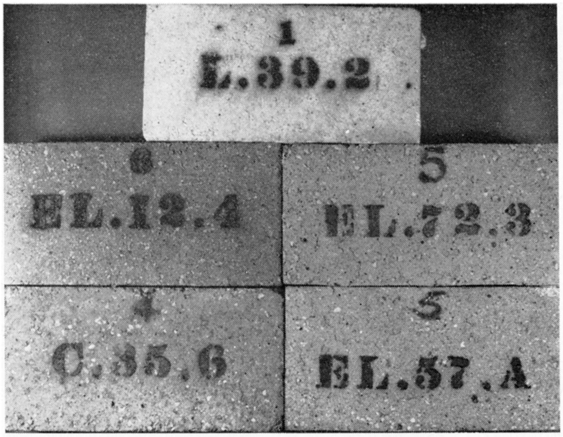 Black and white photo of bricks having acceptable handling strength after hot load testing.