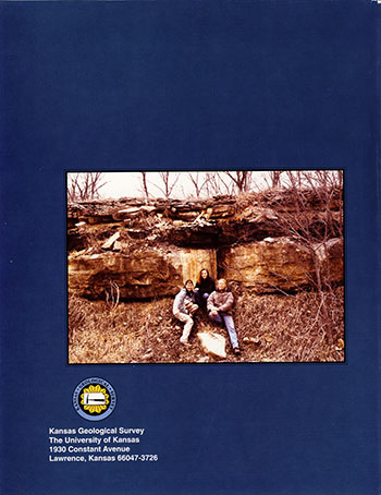 Bover of the book; blue background, white text, color photo of outcrop with researchers.