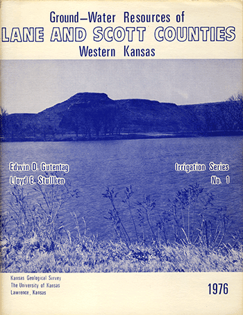Cover of the book; cream paper with blue text; image is a blue-tinted photo of Lake Scott State Park.