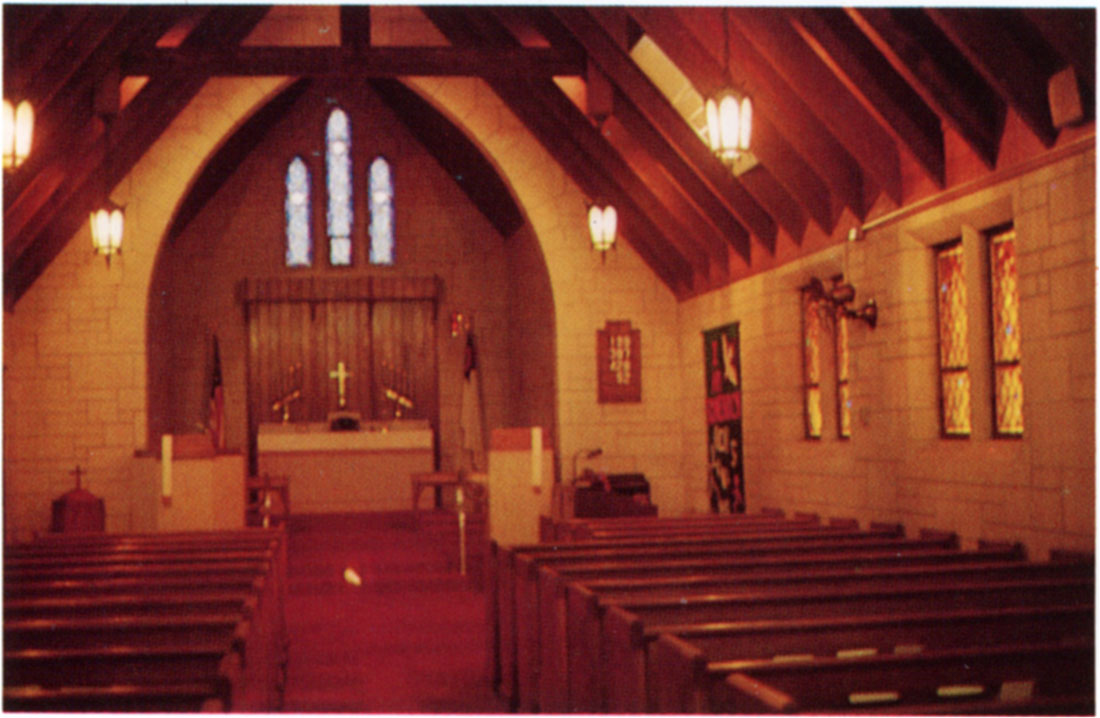 Color photo of interior of Our Redeemer Lutheran Church at Arkansas City.