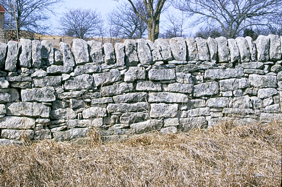 WB-limestone-fence-along-99