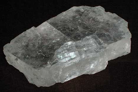 Very clear, almost transparent, rectangular crystal.