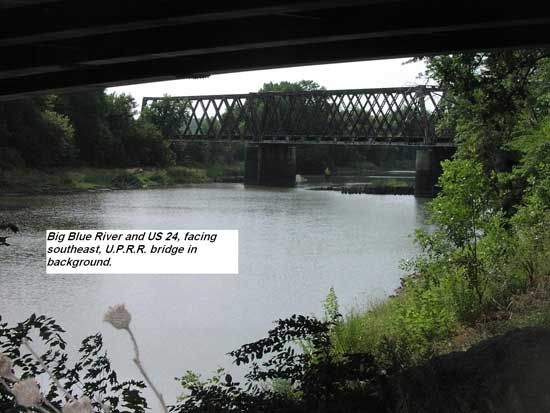 Railroad bridge from under highway bridge