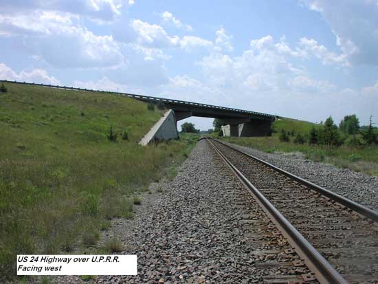 Photo from rail line up toward bridge