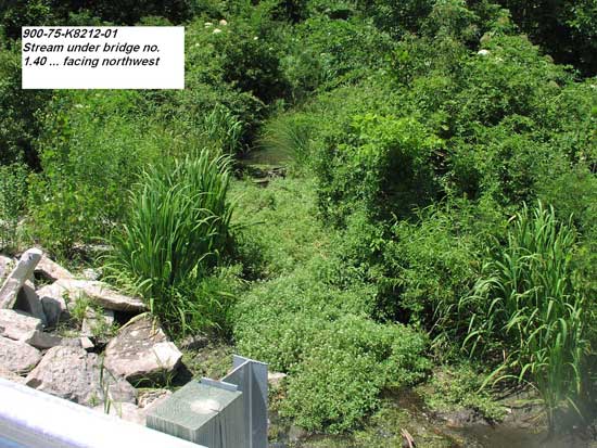 view of small creek from bridge