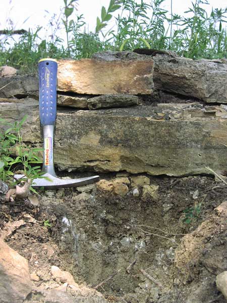Bed in two pieces is about a foot thick (rock hammer for scale)