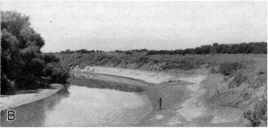 Neosho River with low water level and exposed banks.