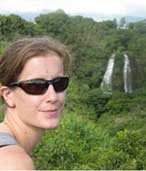 Photo of Andrea Brookfield, waterfall in background.