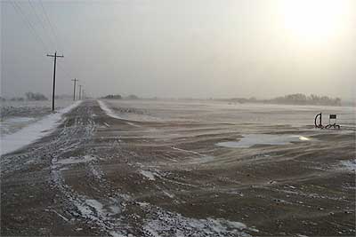 wind-blown snow and ice made work in field impossible