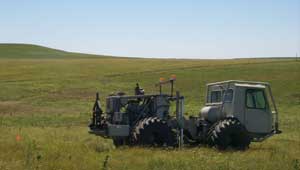 Photo of Vibroseis truckk in field