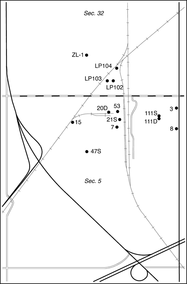 Wells scattered near intersection of the railroad lines