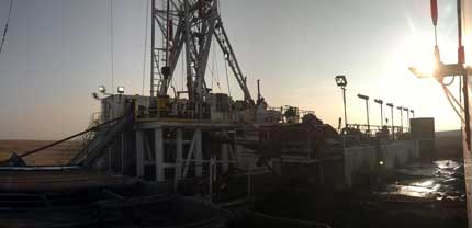 evening photo of Cutter KGS well 1 site