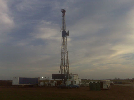 picture of drilling rig at twilight