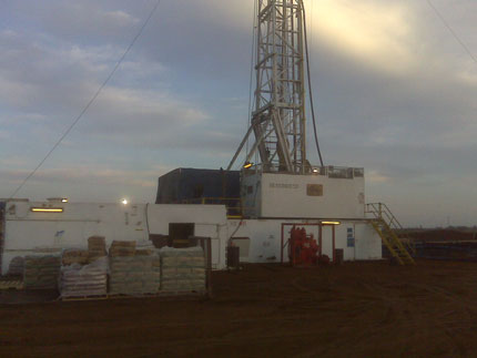 picture of drilling rig at twilight