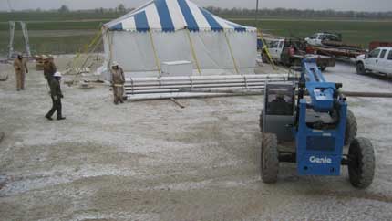 Handlging core barrel with fork lift.