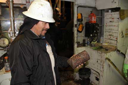 Gilbert holding granite core.