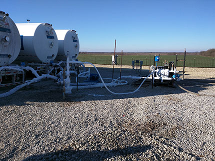 Shows overall injection and monitoring setup: 3 of 4 storage tanks, pump, etc.