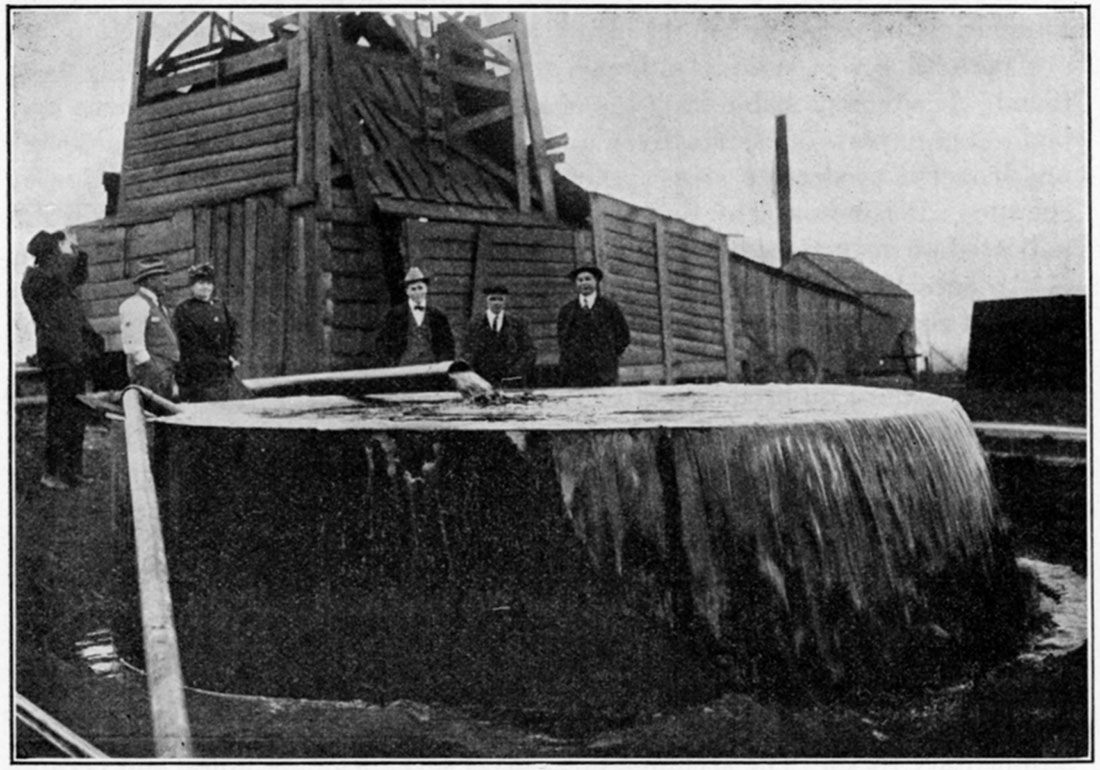 Black and white photo of a Kansas gusher.