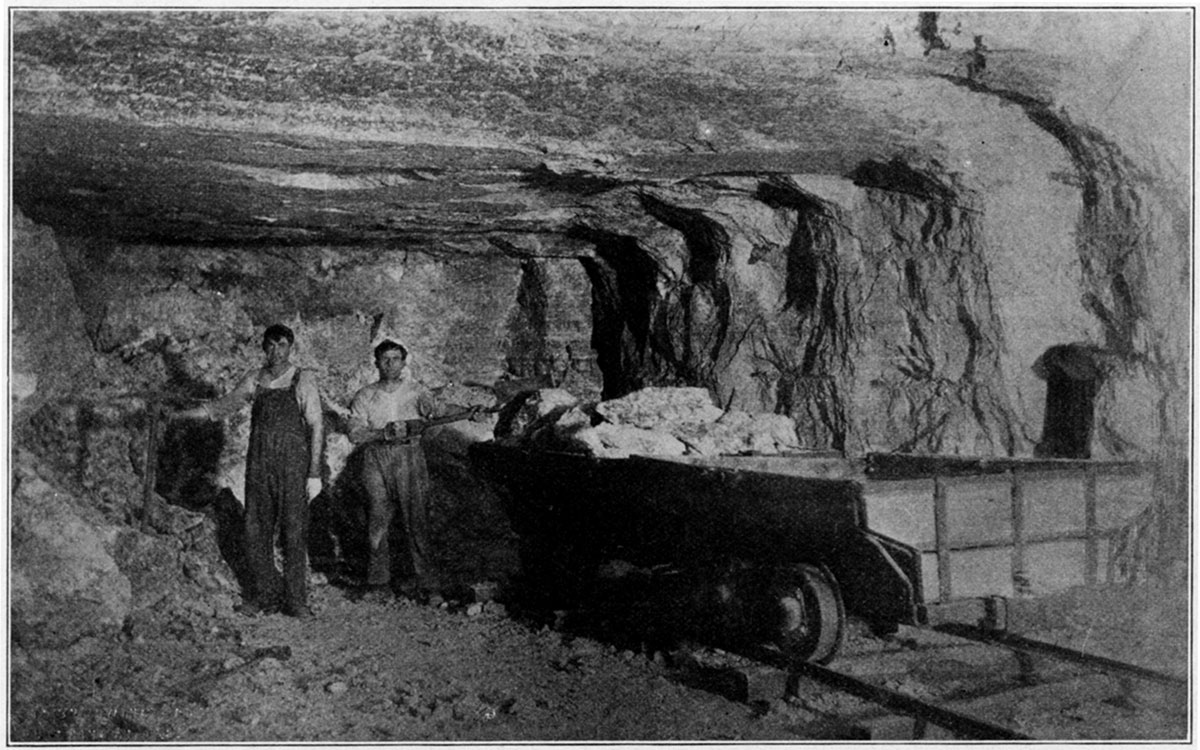 Black and white photo of loading salt in Kansas salt mine.