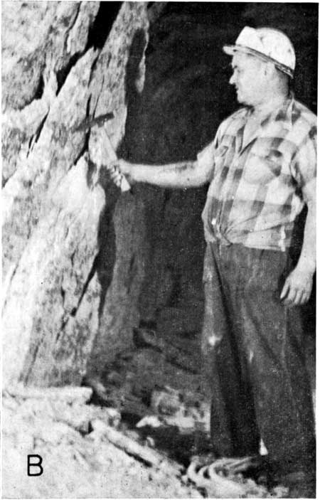 Black and white photo of man next to pillar showing flat plates flaking off pillar onto floor.