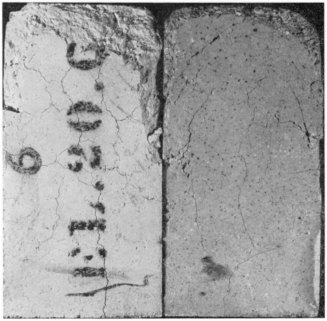 Black and white photo of high-silica-content bricks showing thermal shock induced by load-test heating.