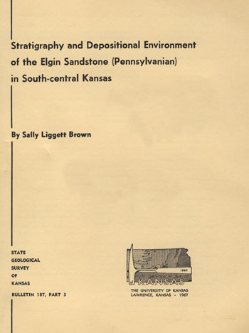 Cover of the book; beige paper with black text; small logo of state outline with rock pick.