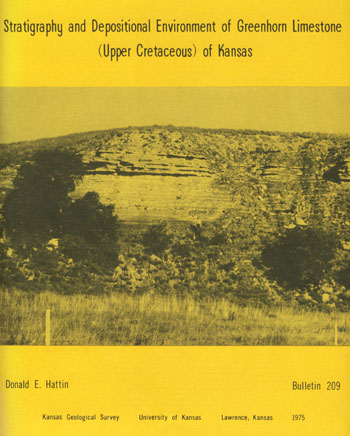 Cover of the original printing of the book; yellow color; black and white photo of Jetmore Member in Russell Co.