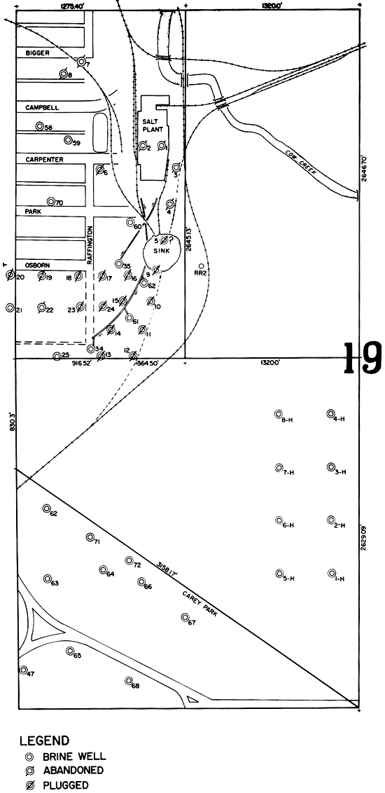 Sketch shows relation of wells, rail lines, and subsiding areas, and sinkhole.