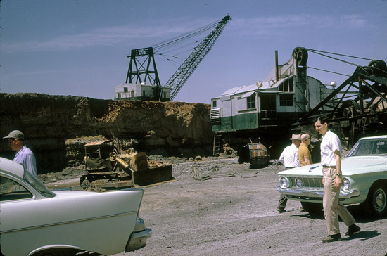 two large coal mining shovels, possibly taken at a field trip