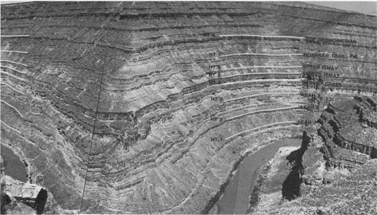 Black and white photo of canyon of meandering San Juan River.