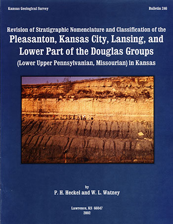 Cover of the book; blue background, white text, color photo of outcrop with researchers.