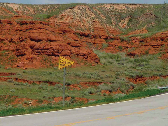 Color photo of red hills with Whitehorse Formation exposed.