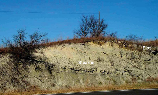 Color photo of roadcut, Eiss Ls Mbr of Bader Ls above Stearns Sh.