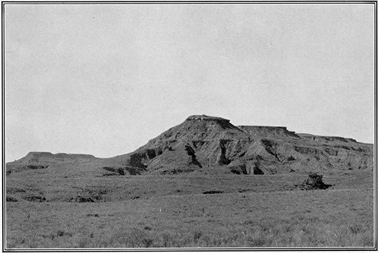 Black and white photo of gypsum-capped hills in the Permian red-beds country near Medicine Lodge, Barber County.