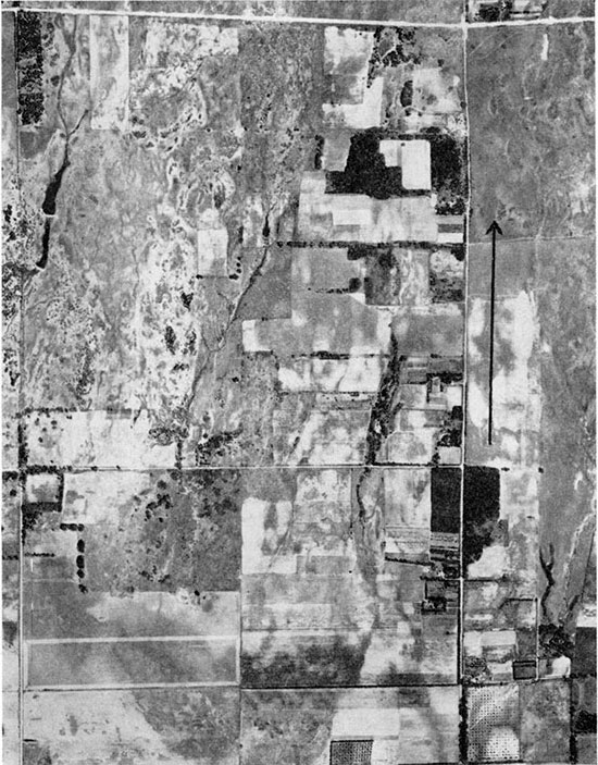 Deployment of drainageways from the sand hills on the surface of Arkansas Valley shown by aerial photograph.