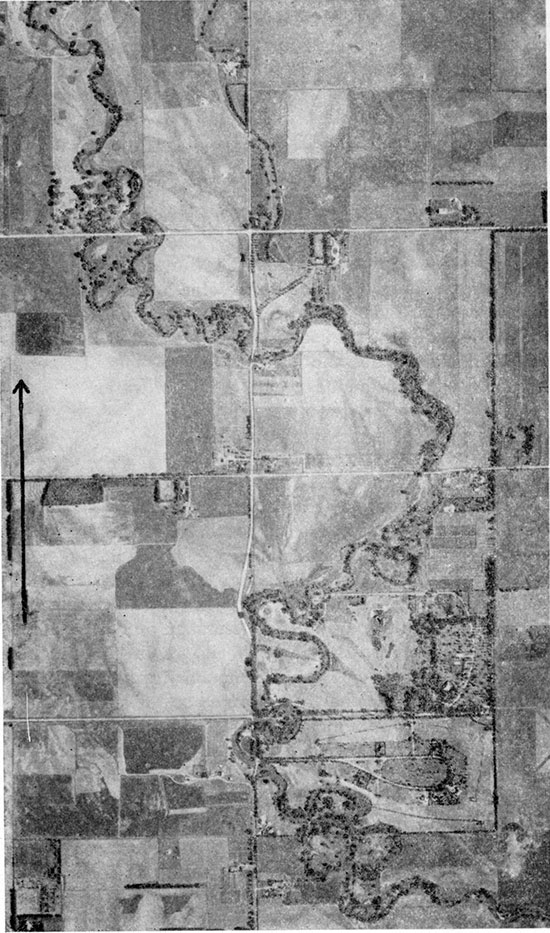 The meandering channel of Cow Creek northeast of Hutchinson shown by aerial photograph.
