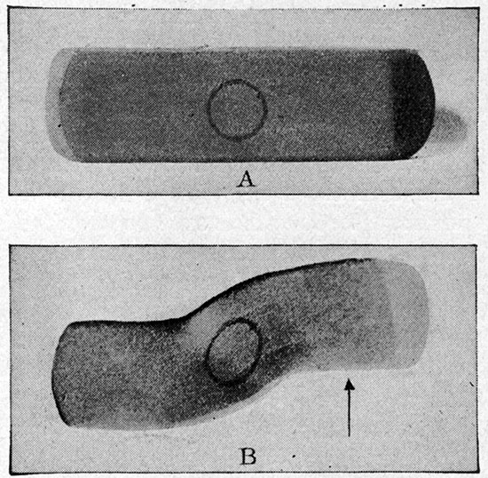 A circle on a rubber eraser, elongated by distorting the eraser.