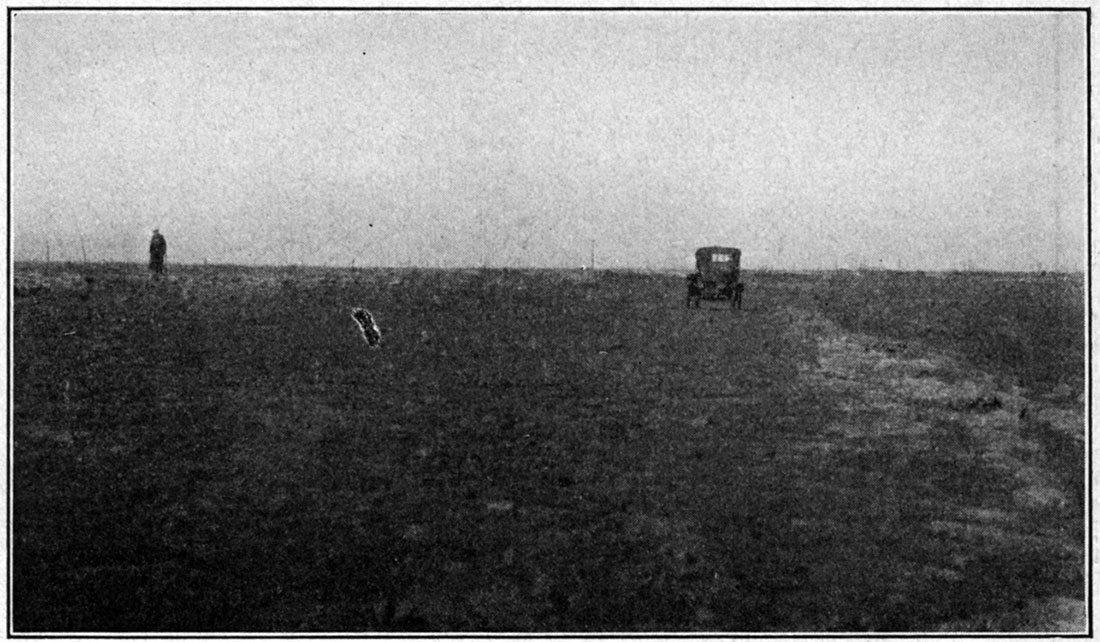 Black and white photo showing outcrop of Winfield limestone, forming a double bench.