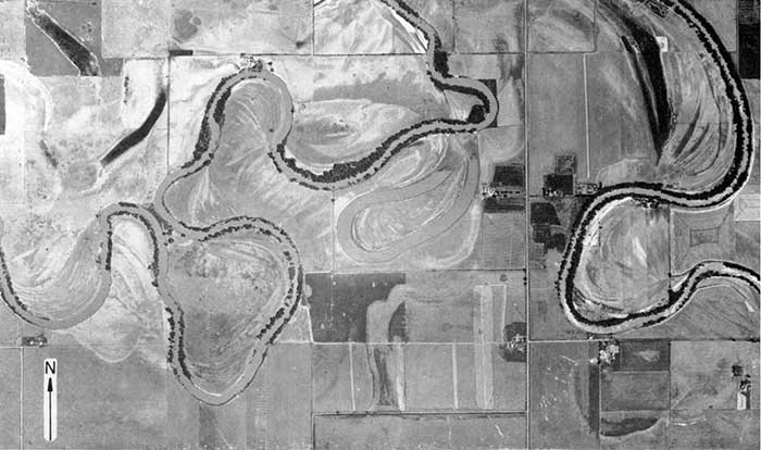 Black and white aerial photo of Smoky Hill River in Dickinson County shows meanders, old meanders in cultivated fields.