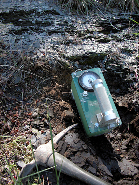 Geiger counter on an outcrop of the Heebner Shale.