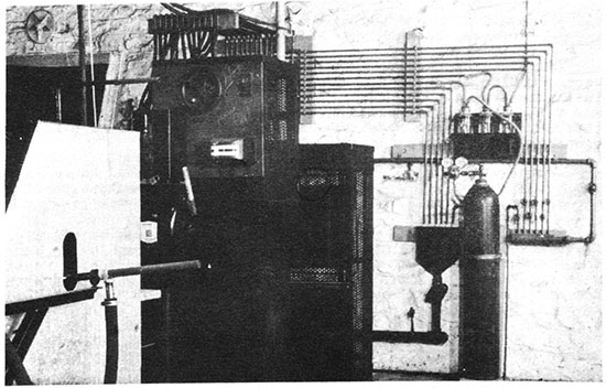 Bkack and white photo of experimental blowing equipment.