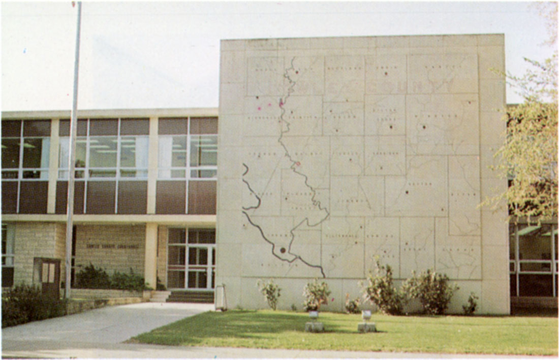 Color photo of the unique map and Cowley County courthouse at Winfield.